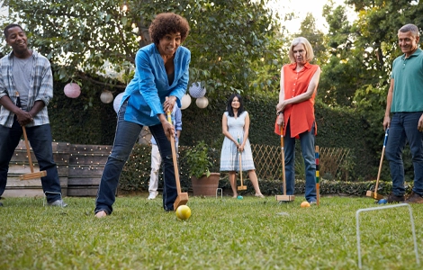 Woan playing croquet